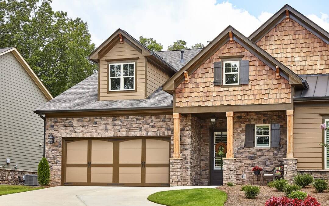 Brown garage door with Stone Accents | Horizon Stone