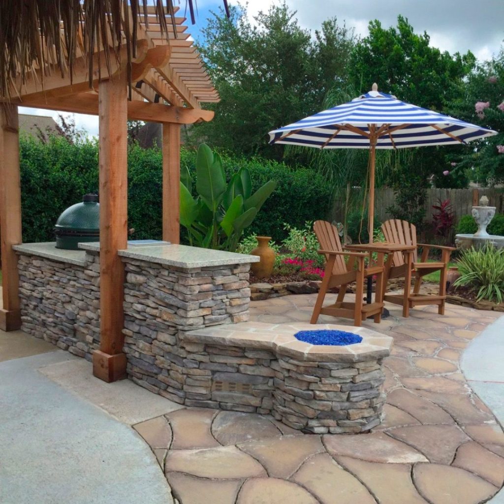 Stone veneer fire pit