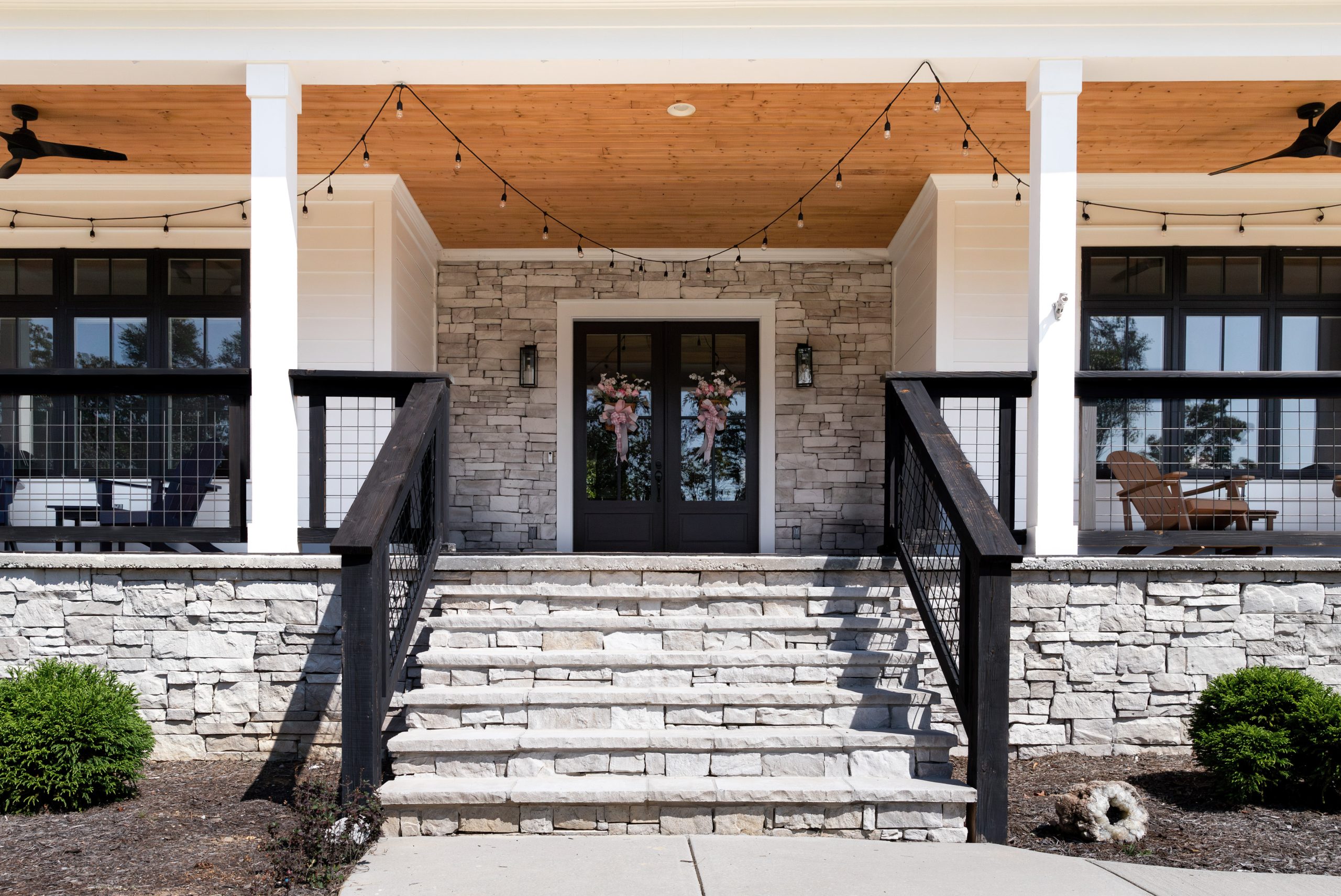 Grand entryway and front porch in the light colored Hermitage stone collection from Horizon Stone.