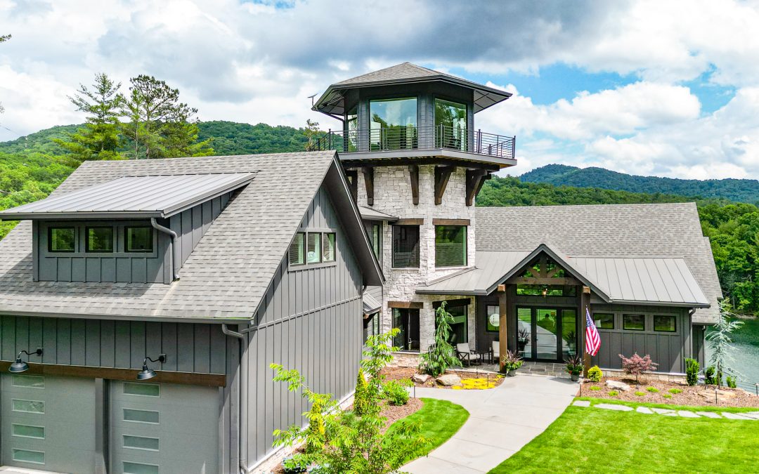 Lakeside home featuring Horizon Stone 19th Century Hermitage stone veneer accent on exterior tower and entryway