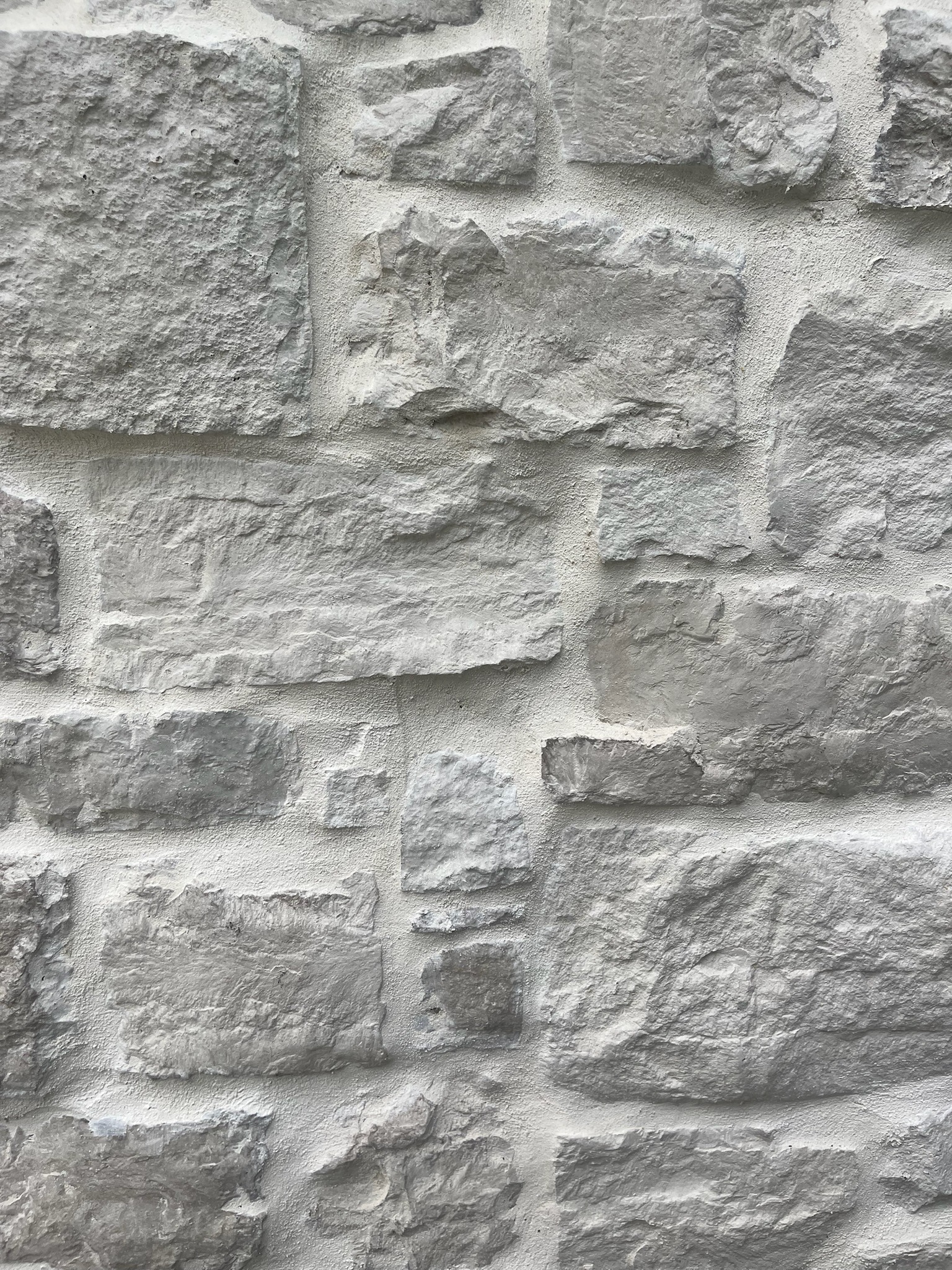 Close-up texture and color variation in 19th Century Hermitage manufactured stone veneer